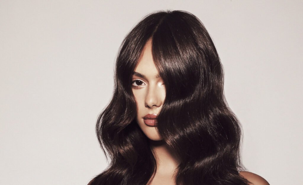 A professional blow-dry session at HOB Salons showcasing flawless hair results from the HOB Blow Dry Club collection.