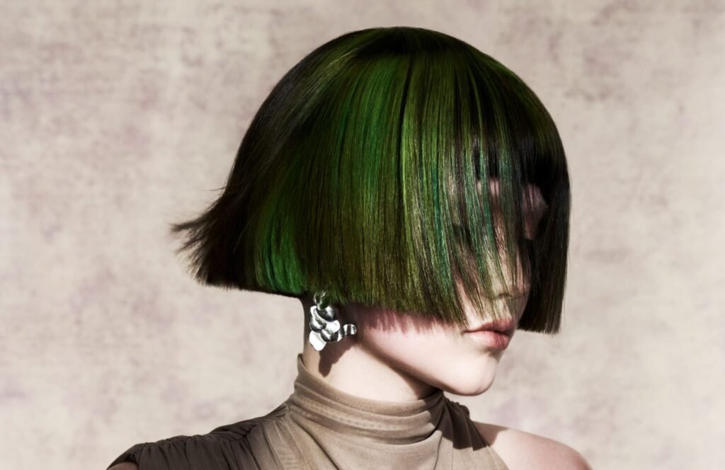 A striking hairstyle from Illuminate by Jon Wilsdon, showcasing the interplay of light to define shape and form.