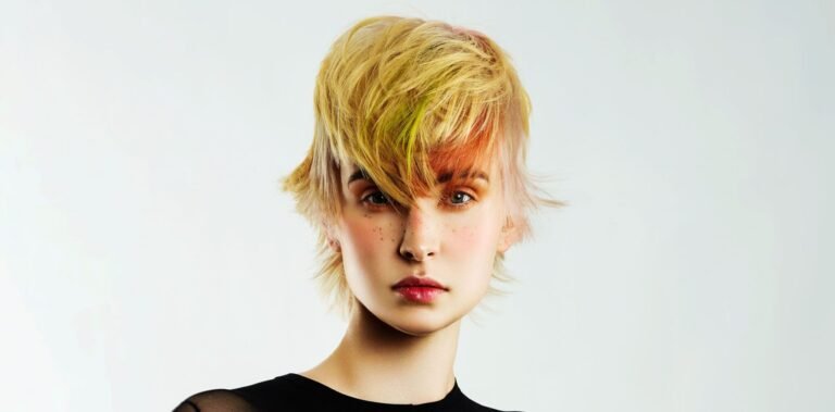 A nature-inspired hairstyle from CONNEXION by Isabelle Lachance, featured in The Hair Magazine, showcasing raw textures and organic, forest-inspired shapes.