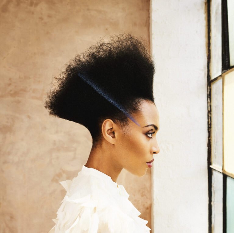 Disconnected Beauty hair collection contrasting digital perfection with raw reality — sleek, textured, and geometric styles.