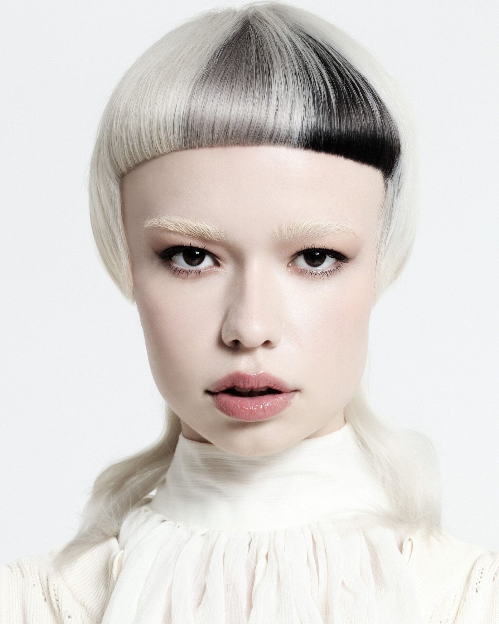 Suzie McGill presenting her Cloud Dancer platinum blonde and ashy white color style.